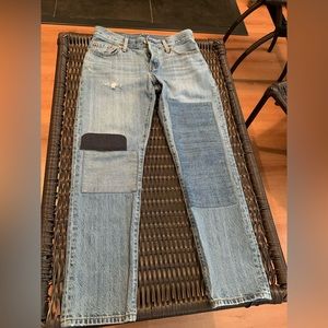 Distress women’s jeans, slightly worn